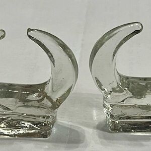 Set of 16 handcrafted clear glass napkin rings, slight variations in each